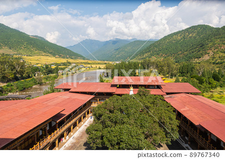 Bhutan - October 24, 2021: Inside  Punakha Dzong in Bhutan. Punakha Dzong Monastery, one of the largest monasteries in Asia. The delicate decoration inside of punakha dzong, Bhutan. traditional facade 89767340