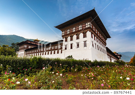 Thimphu, Bhutan - October 24, 2021: Tashichho Dzong, a Buddhist monastery and fortress on the northern edge of the city of Thimphu. Tashichho Dzong in the Capital of Bhutan.   building 89767441