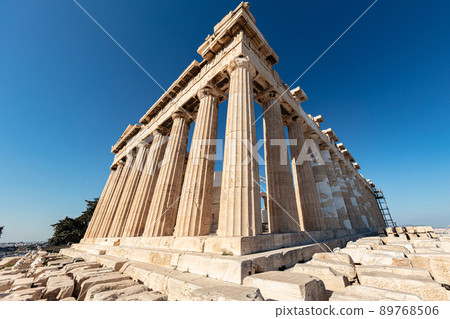 Athens, Greece - July 26, 2021: The acropolis, most famous citadel the Parthenon on the hills of Athens.  One of the most visited travel destinations. Tourists from all over the world come to visit 89768506