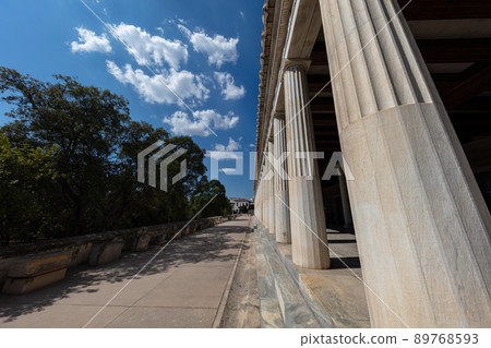 Athens, Greece - July 26, 2021: Stoa of Attalos, covered walkway or portico in the Agora of Athens. Typical for Hellenistic age, the stoa was more elaborate and larger than earlier building of ancient Athens, Greece - July 26, 2021: Stoa of Attalos, covered walkway or portico in the Agora of Athens. Typical for Hellenistic age, the stoa was more elaborate and larger than earlier building of ancient 89768593