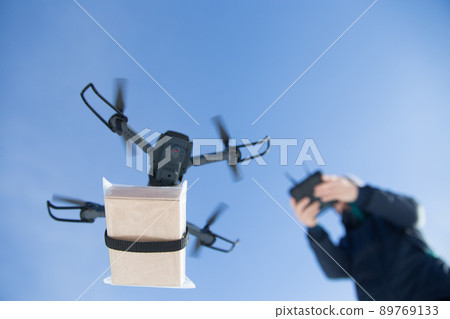 Carry luggage with a drone 89769133