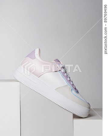 trendy sneakers. fashion shoes still life. gumshoes 89769496