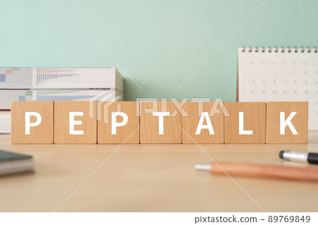 Image of scolding encouragement | Desk with building blocks with "PEPTALK" written on it 89769849