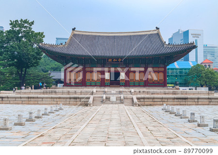 Seoul, South Korea - July 25, 2021: Junghwajeon, main hall of Deoksu Palace. Deoksugung was originally the residence of Grand Prince Wolsan. The residence became a royal palace during the Imjin war. Seoul, South Korea - July 25, 2021: Junghwajeon, main hall of Deoksu Palace. Deoksugung was originally the residence of Grand Prince Wolsan. The residence became a royal palace during the Imjin war. 89770099