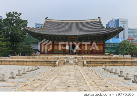 Seoul, South Korea - July 25, 2021: Junghwajeon, main hall of Deoksu Palace. Deoksugung was originally the residence of Grand Prince Wolsan. The residence became a royal palace during the Imjin war. Seoul, South Korea - July 25, 2021: Junghwajeon, main hall of Deoksu Palace. Deoksugung was originally the residence of Grand Prince Wolsan. The residence became a royal palace during the Imjin war. 89770100