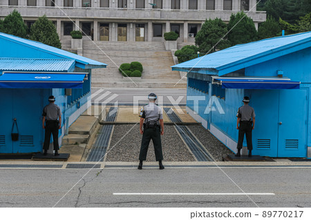Panmunjom, South Korea - July 28, 2020: The Demilitarized zone or DMZ between the two Korean countries. Running across the Korean Peninsula near the 38th parallel north. The most protected border Panmunjom, South Korea - July 28, 2020: The Demilitarized zone or DMZ between the two Korean countries. Running across the Korean Peninsula near the 38th parallel north. The most protected border 89770217