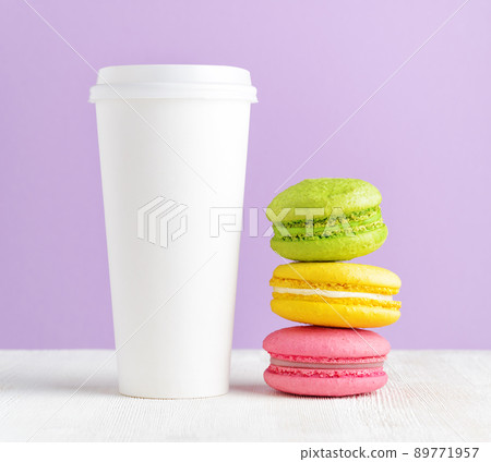 Macaron and tumbler of coffee Macaron and tumbler of coffee 89771957