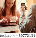 Couple ignoring each other busy with their mobile devices 89772131