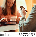 Couple ignoring each other busy with their mobile devices 89772132