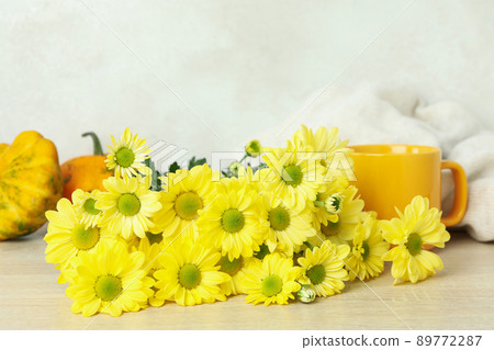 Autumn composition with chrysanthemums on wooden table 89772287