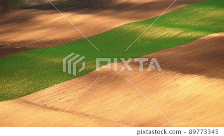 Beautiful landscape with spring nature. Waves on the field. South Moravia - Moravian Tuscany - Czech Republic Europe.. Beautiful landscape with spring nature. Waves on the field. South Moravia - Moravian Tuscany - Czech Republic Europe.. 89773345