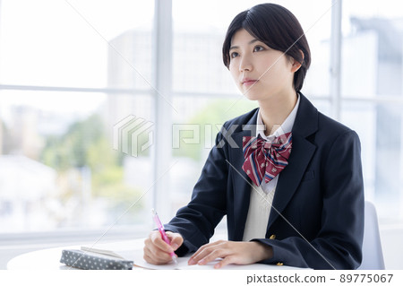 Portrait of a high school girl studying 89775067