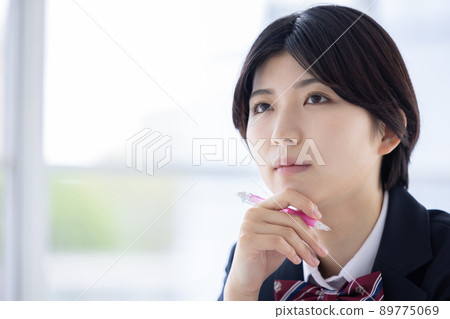 Portrait of a high school girl studying 89775069