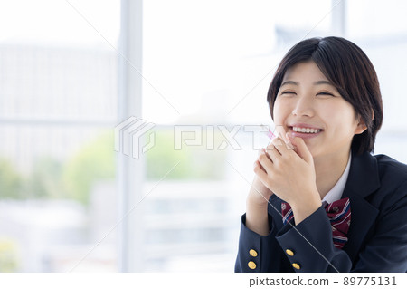 Portrait of a high school girl studying 89775131