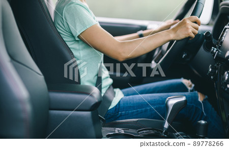 Driver driving car in the spring nature Driver driving car in the spring nature 89778266