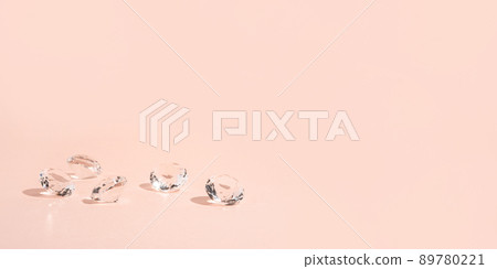 Pink background for product presentation with diamonds. Minimal concept and hard sunlight. 89780221