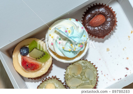 delicious cup cake in difference topping delicious cup cake in difference topping 89780283