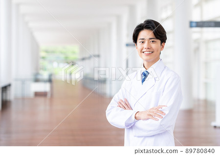 A young man in a white coat A young man in a white coat 89780840