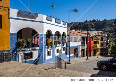 Teror at Gran Canaria, Spain. A beautiful traditional town with colorful houses with wooden balconies 89781746