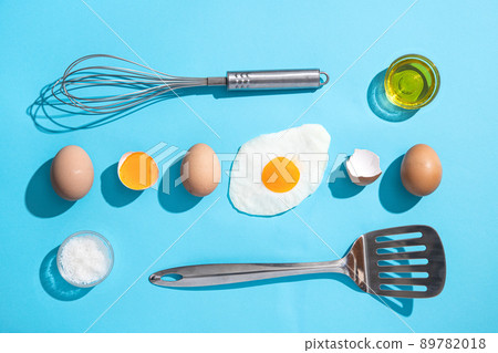 Flat lay composition of different eggs on blue background. Flat lay composition of different eggs on blue background. 89782018