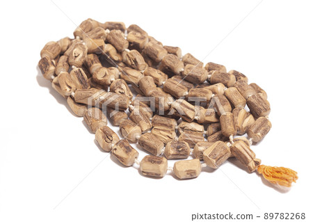 Rosary or prayer beads isolated on white background Rosary or prayer beads isolated on white background 89782268