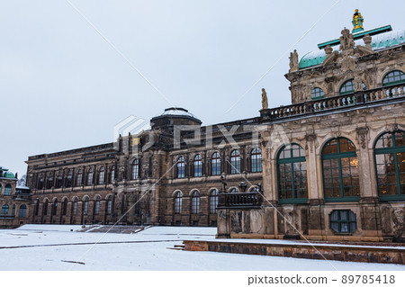 Snow-covered gardens and Old Masters Picture Gallery in the Zwinger Palace in the old town of Dresden, Germany 89785418