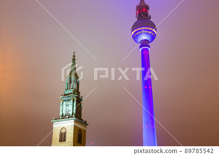 St. Mary's Church and TV Tower illuminated at night in Berlin, Germany 89785542
