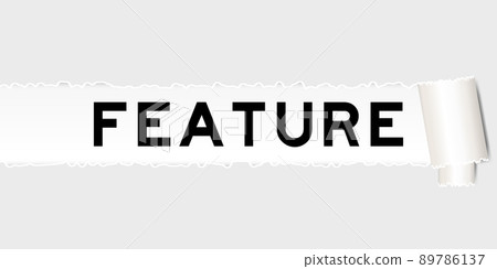 Ripped gray paper background that have word feature under torn part 89786137