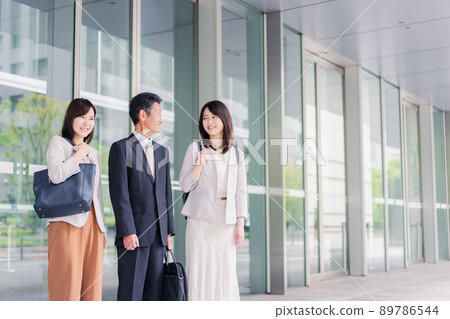 A business person who walks in the office district 89786544