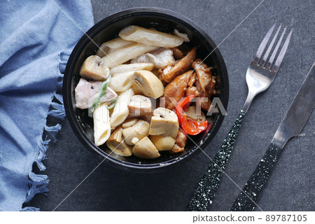 homemade cooked chicken mushroom pasta in a bowl  89787105
