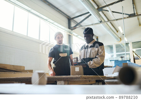 People packing products at warehouse People packing products at warehouse 89788210