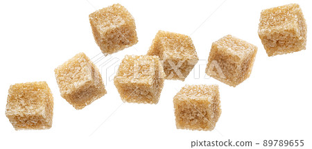 Falling cubes of cane sugar isolated on white background 89789655