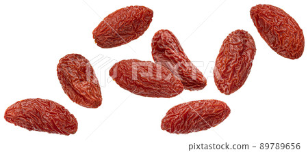 Falling dried goji berries isolated on white background Falling dried goji berries isolated on white background 89789656
