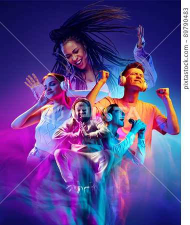 Poster with excited beautiful male and female models on dark blue color background in neon light, filter. Concept of emotions, youth, fashion, ad 89790483