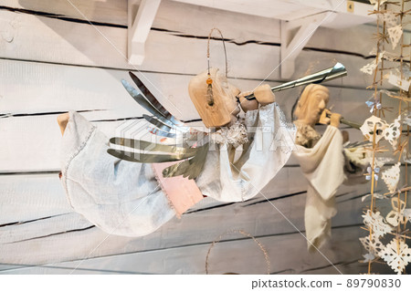 Angel with trumpet or horn announcing the Good News. Home decoration, toy. Front view. 89790830