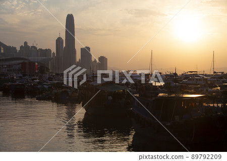 cityscape of Victoria Harbour between Hong Kong island and Kowloon from the view of typhoon shelter, with junk boats cityscape of Victoria Harbour between Hong Kong island and Kowloon from the view of typhoon shelter, with junk boats 89792209