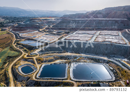 Leaching heaps and storage reservoirs at copper ore processing plant. Skouriotissa, Cyprus Leaching heaps and storage reservoirs at copper ore processing plant. Skouriotissa, Cyprus 89793132
