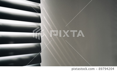 Space shadow. Sunlight architecture abstract background with light, black shadow overlay from window on white texture wall. Organic drop diagonal shadow for Decorative and backdrop. Space shadow. Sunlight architecture abstract background with light, black shadow overlay from window on white texture wall. Organic drop diagonal shadow for Decorative and backdrop. 89794204