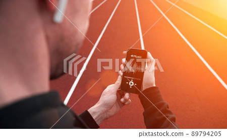 Sport music. Lifestyle workout exercise man training. Male with headphones. Sport music and healthy lifestyle. Sport music. Lifestyle workout exercise man training. Male with headphones. Sport music and healthy lifestyle. 89794205