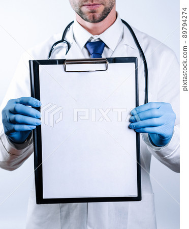 Doctor banner. Happy nurse in blue gloves, clipboard hospital wearing scrubs, provide checkup, examine patient in clinic. Medical care, insurance, prescription, paper work or career banner. 89794274