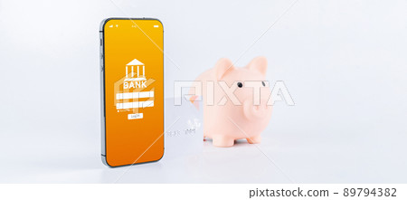 Internet based banking. Mobile phone with internet online bank app. Pig bank with credit card on white background. Online wallet save money. Internet based banking. Mobile phone with internet online bank app. Pig bank with credit card on white background. Online wallet save money. 89794382