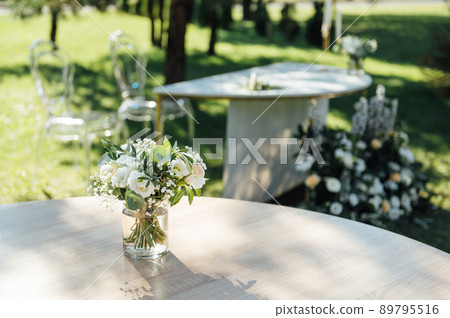 Beautiful decoration at the wedding on the table for guests Beautiful decoration at the wedding on the table for guests 89795516