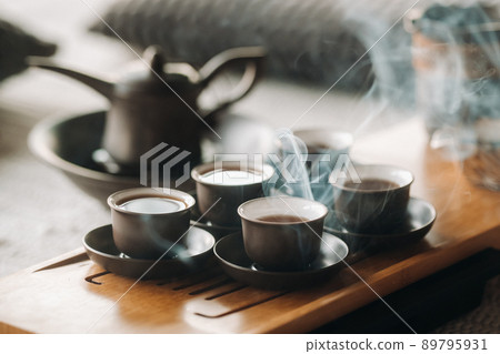 Preparing for a tea ceremony with a large company 89795931