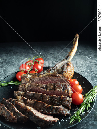 Tomahawk steak from the Ribeye, Irish beef, grilled Tomahawk steak from the Ribeye, Irish beef, grilled 89796944