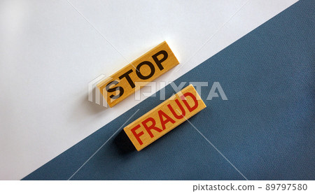 'Stop fraud' words on wooden blocks. Business concept. Beautiful white and blue background. 89797580