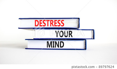 Destress your mind symbol. Concept words Destress your mind on books. Beautiful white table white background. Psychological business and destress your mind concept. Copy space. Destress your mind symbol. Concept words Destress your mind on books. Beautiful white table white background. Psychological business and destress your mind concept. Copy space. 89797624
