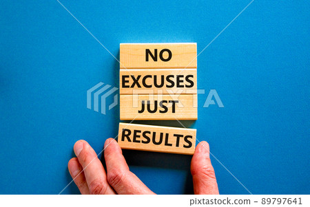 No excuses just results symbol. Concept words No excuses just results on wooden blocks. Businessman hand. Beautiful blue table blue background. No excuses just results business concept. Copy space. 89797641