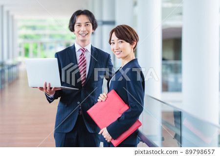 Image of male and female business person Image of male and female business person 89798657