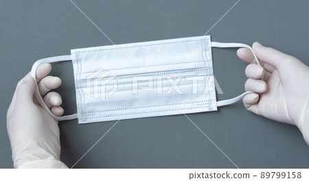 mask and corona virus protection isolated on a gray background 89799158