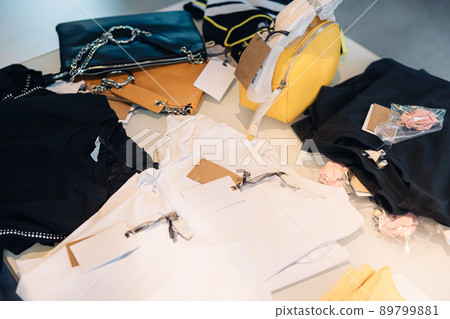 clothing display in fashion shop, for sale. clothes shop background. shopping concept.  89799881
